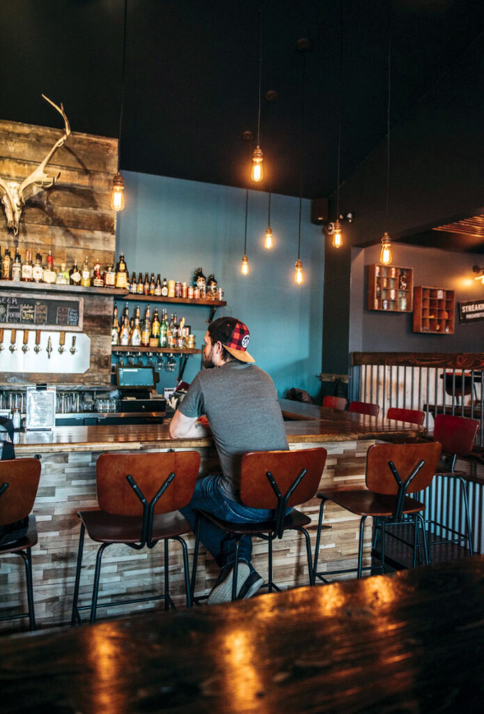 Man sitting at bartop