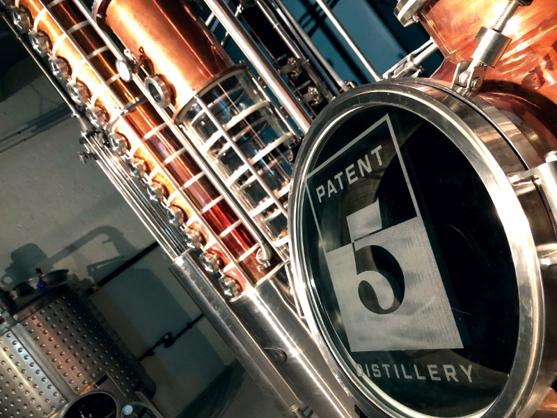 Copper still with Patent 5 logo