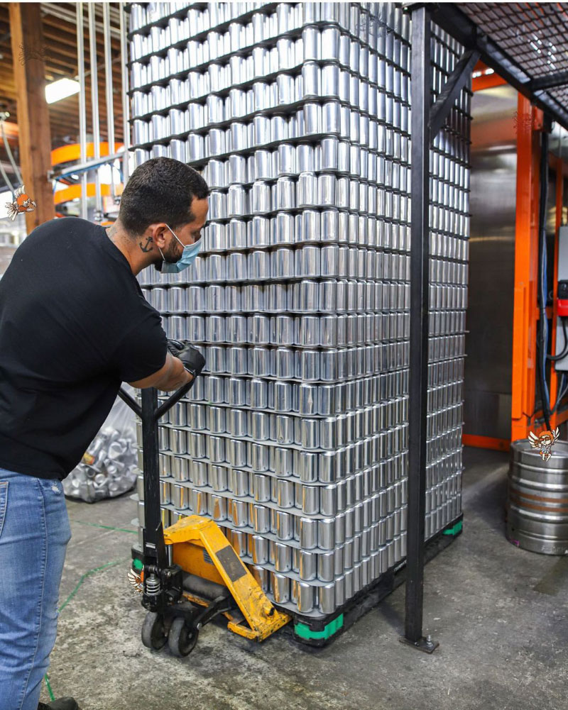 Moving a palette of not-yet-labelled canned beer