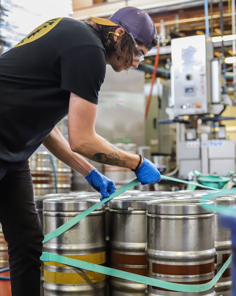 Strapping a palette of mini-kegs