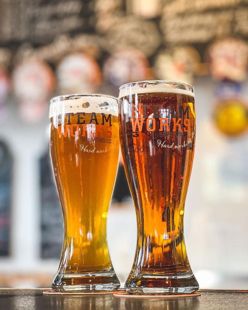 Two glasses of Steamworks beer