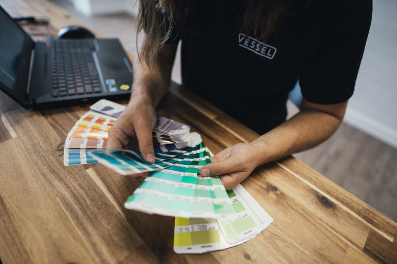 Fanning through colour swatch book