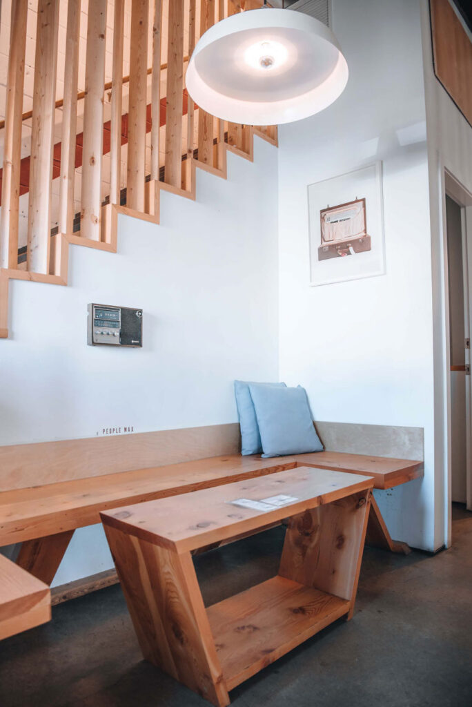 Table and bench in Container Brewing Ltd.