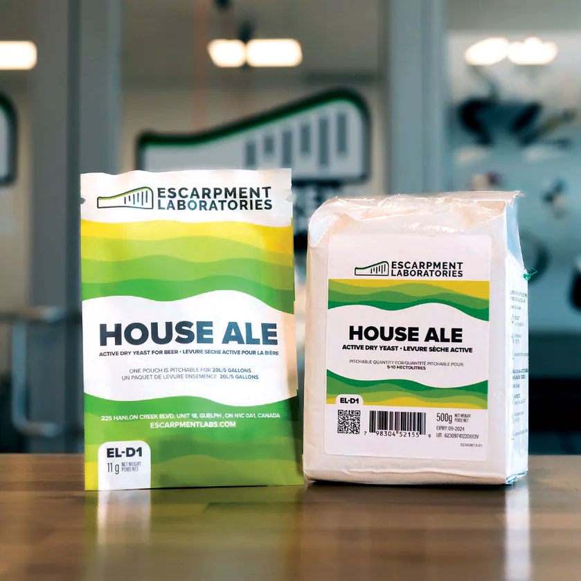 Two bags of active dry yeast on wood table