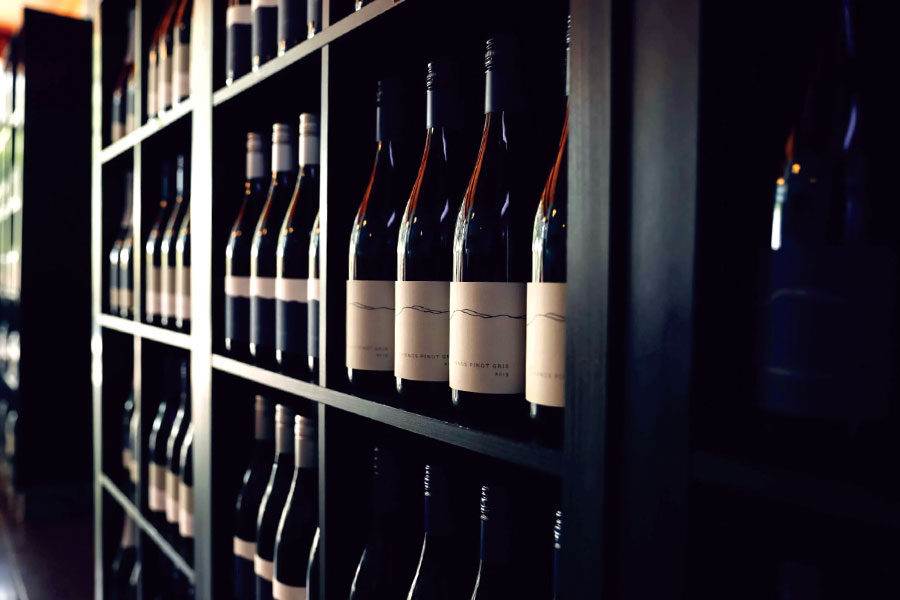 Rows of wine bottles on shelves