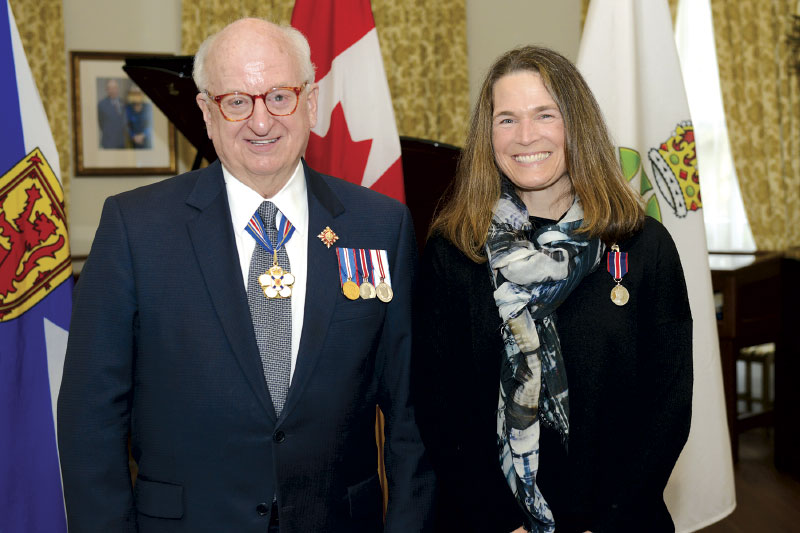 Gina Haverstock being presented the King Charles III Coronation Medal
