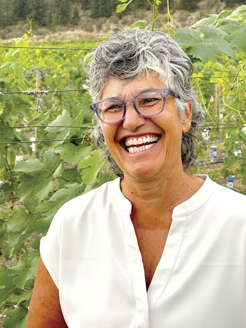 Val Tait, smiling for photo