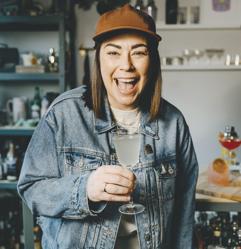 Kaitlyn Stewart with cocktail in hand