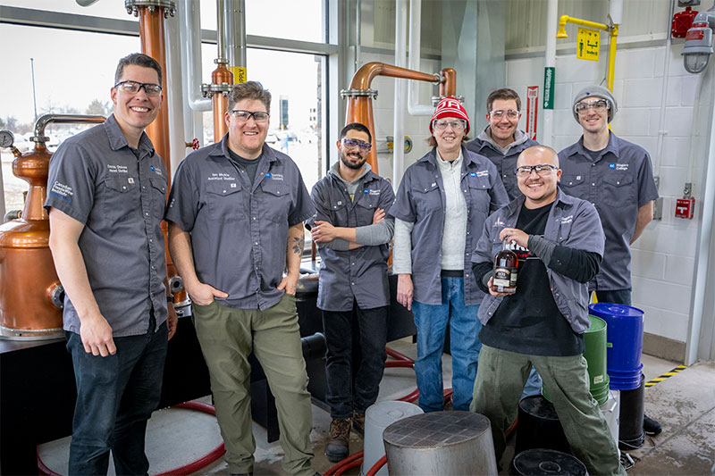 David Dickson, Ian Bickle, Shiamak Mehta, Monique Toronyi, Tanner Cuthbert, Kade Bound and Myles Prior posing for group photo