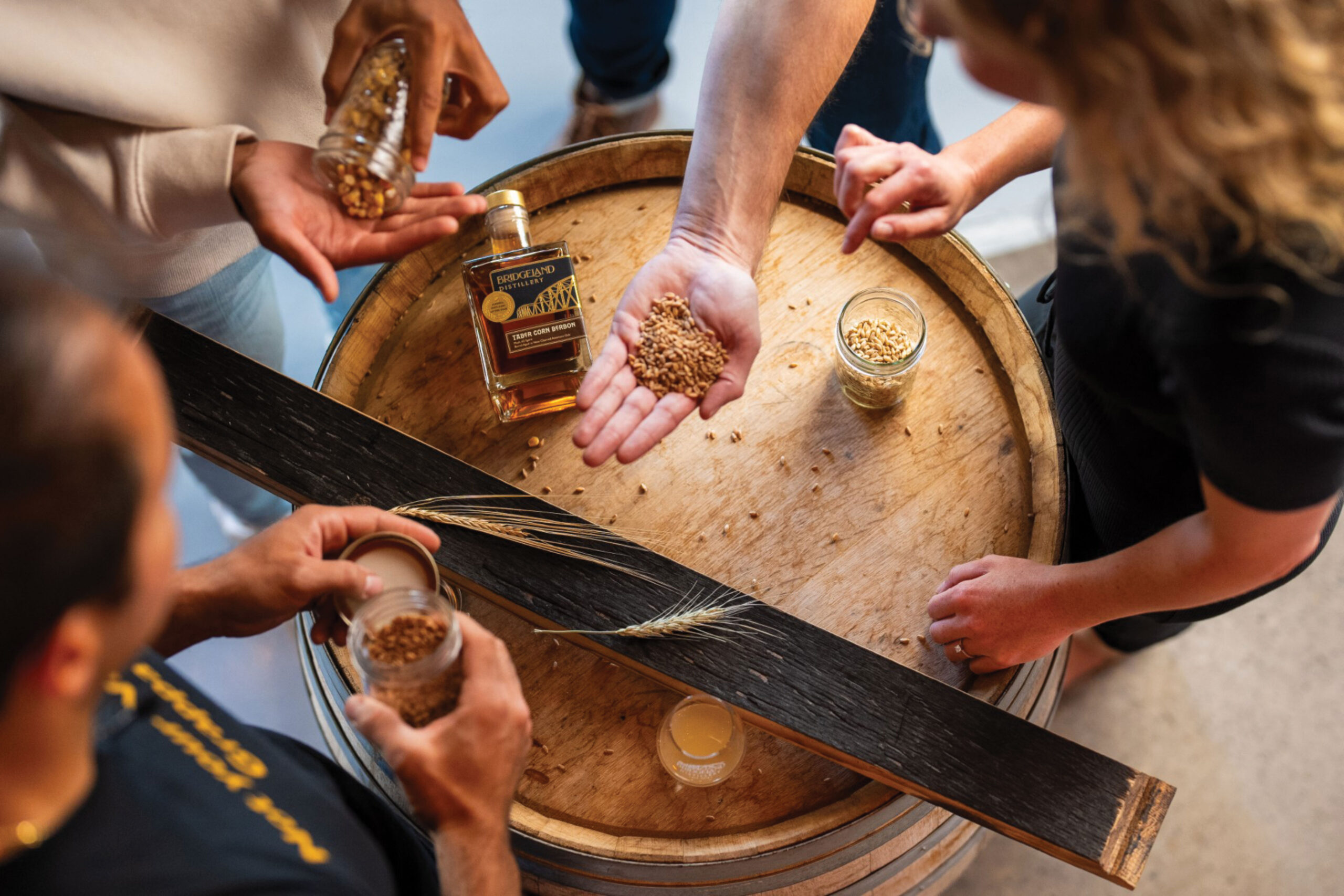 Group looking at jars of barley and oats