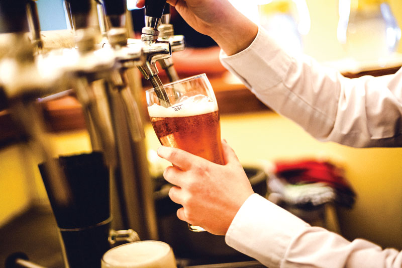 Pouring draught into pint glass