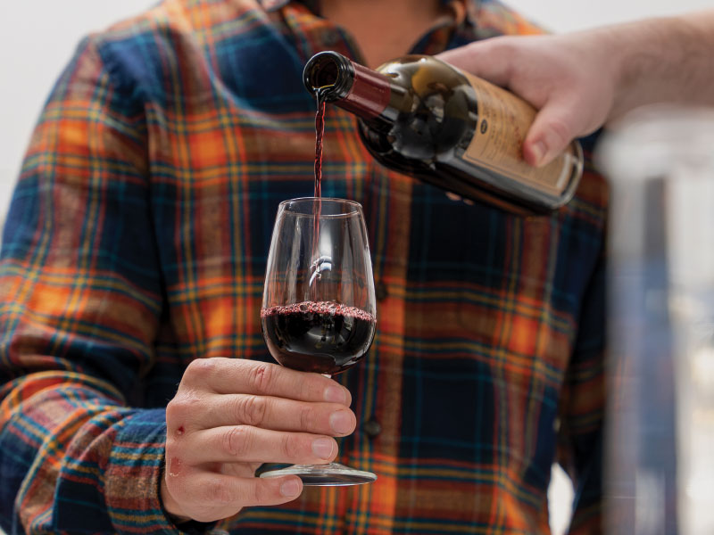 Closeup of wine being poured into a glass