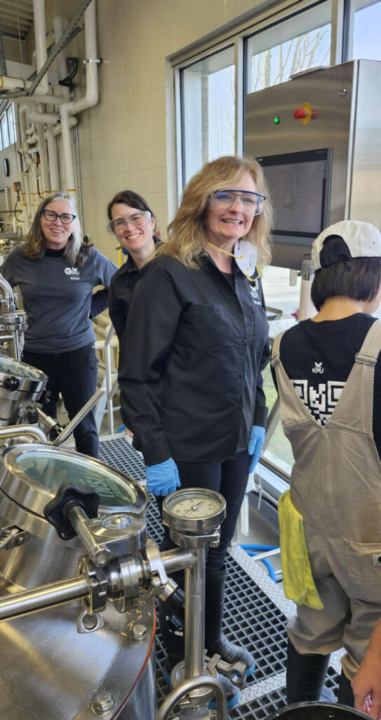 Pink Boots Brewing team smiling for photo