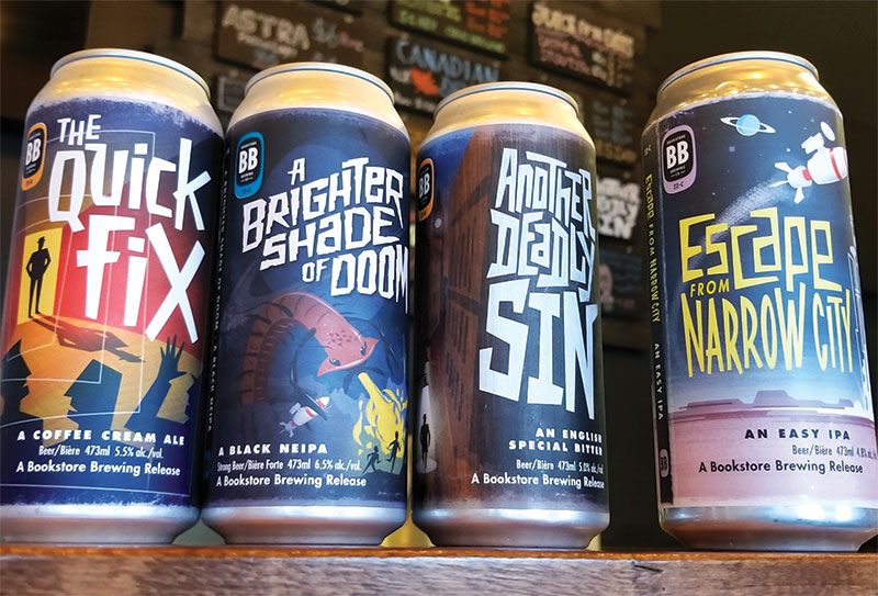 Four various cans of Bookstore Brewing beers