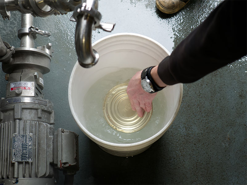 Can of Salvo in bucket