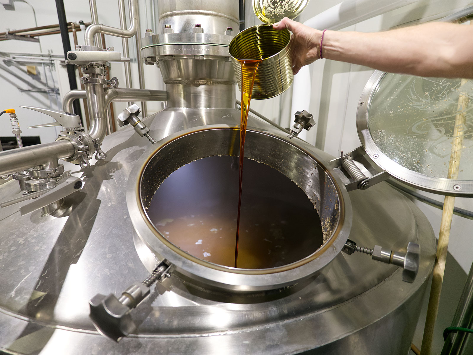 Pouring Salvo into vat