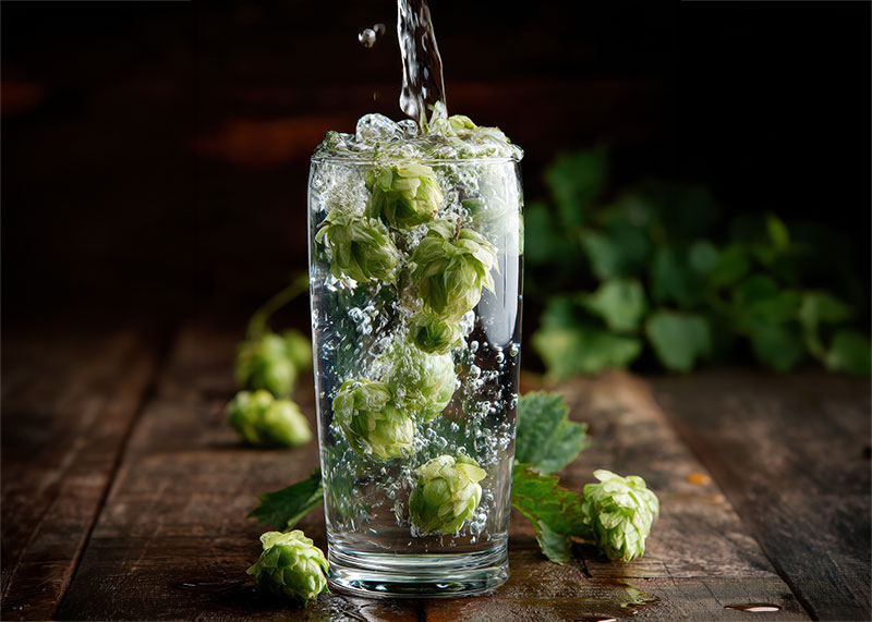 Hop water being poured into glass
