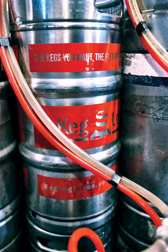 Keg connected to cleaning tubes