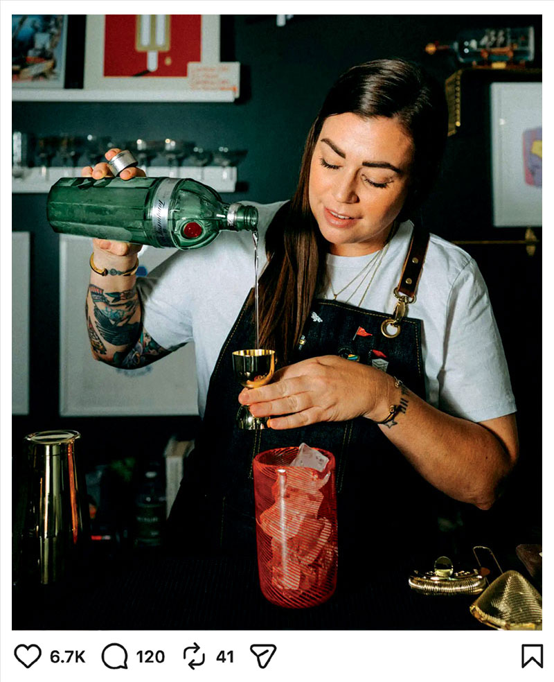 Kaitlyn mixing a cocktail
