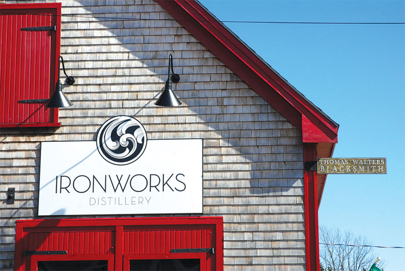 Ironworks sign above entrance to distillery