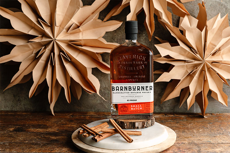Bottle of Barnburner Whisky against festive background