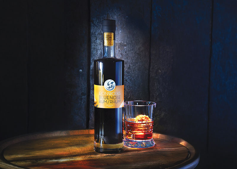 Bottle and glass of Ironworks Bluenose Rum/Rhum