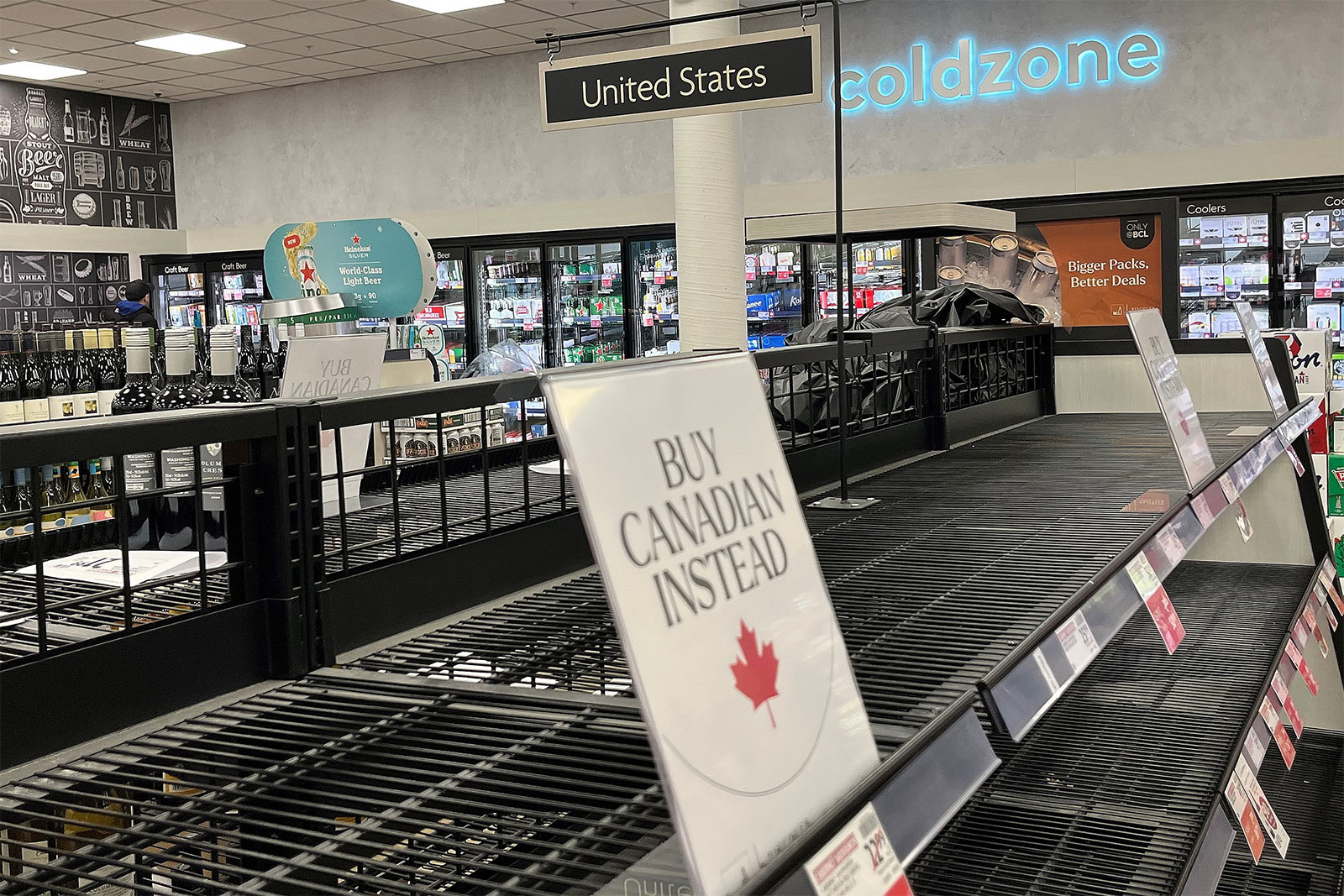 Buy Canadian Instead sign on empty shelf